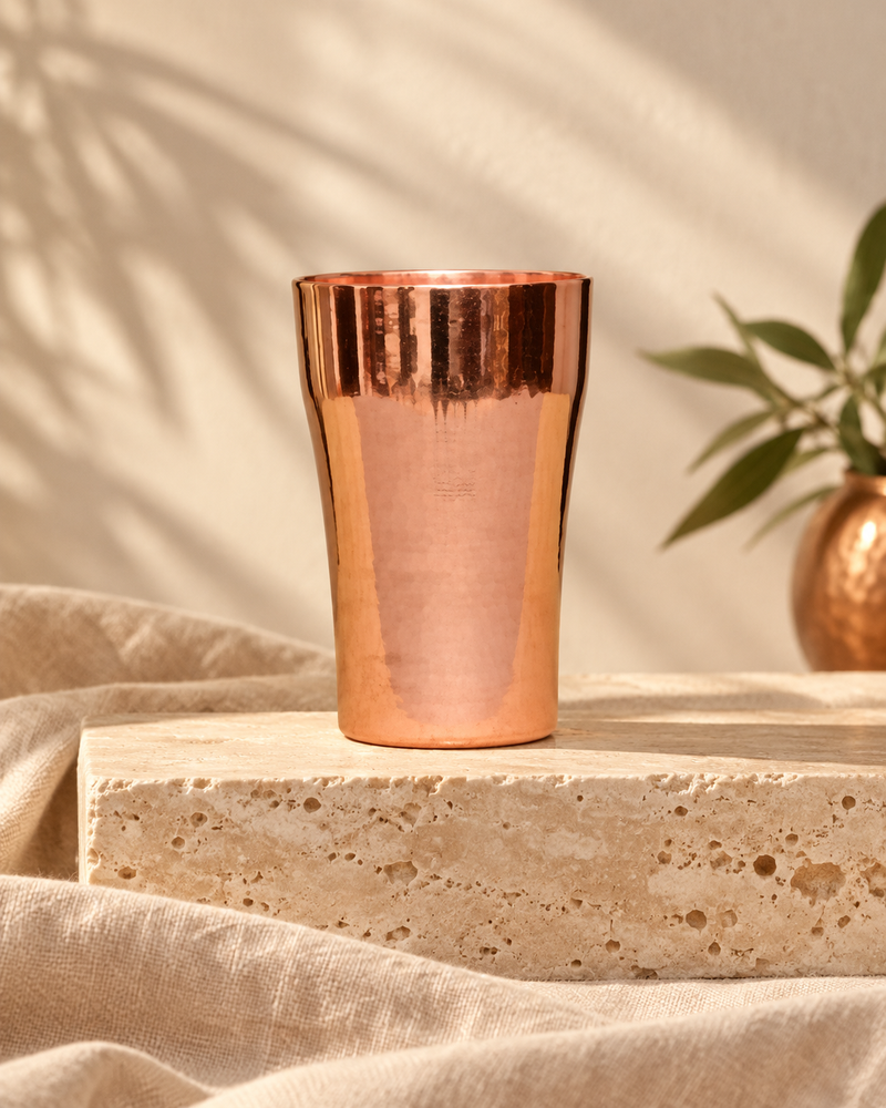 handmade copper water cup thick red copper cup brass cup beer copper cup personalized copper in a warm editorial setting